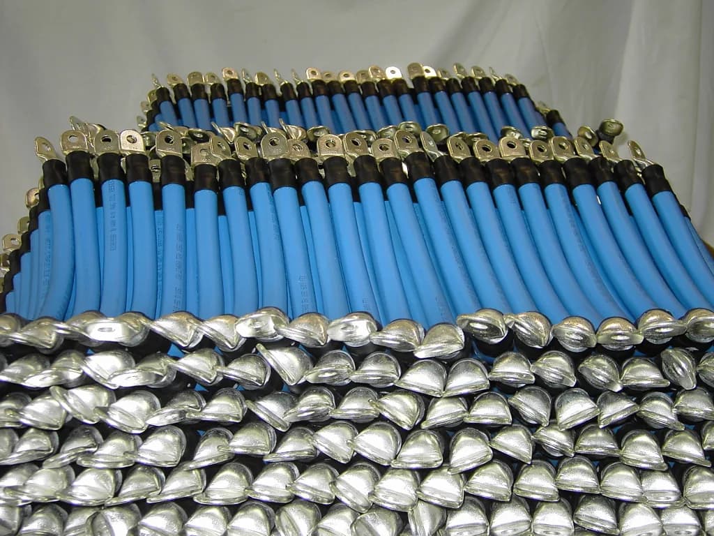 Hundreds of assembled battery cables stacked