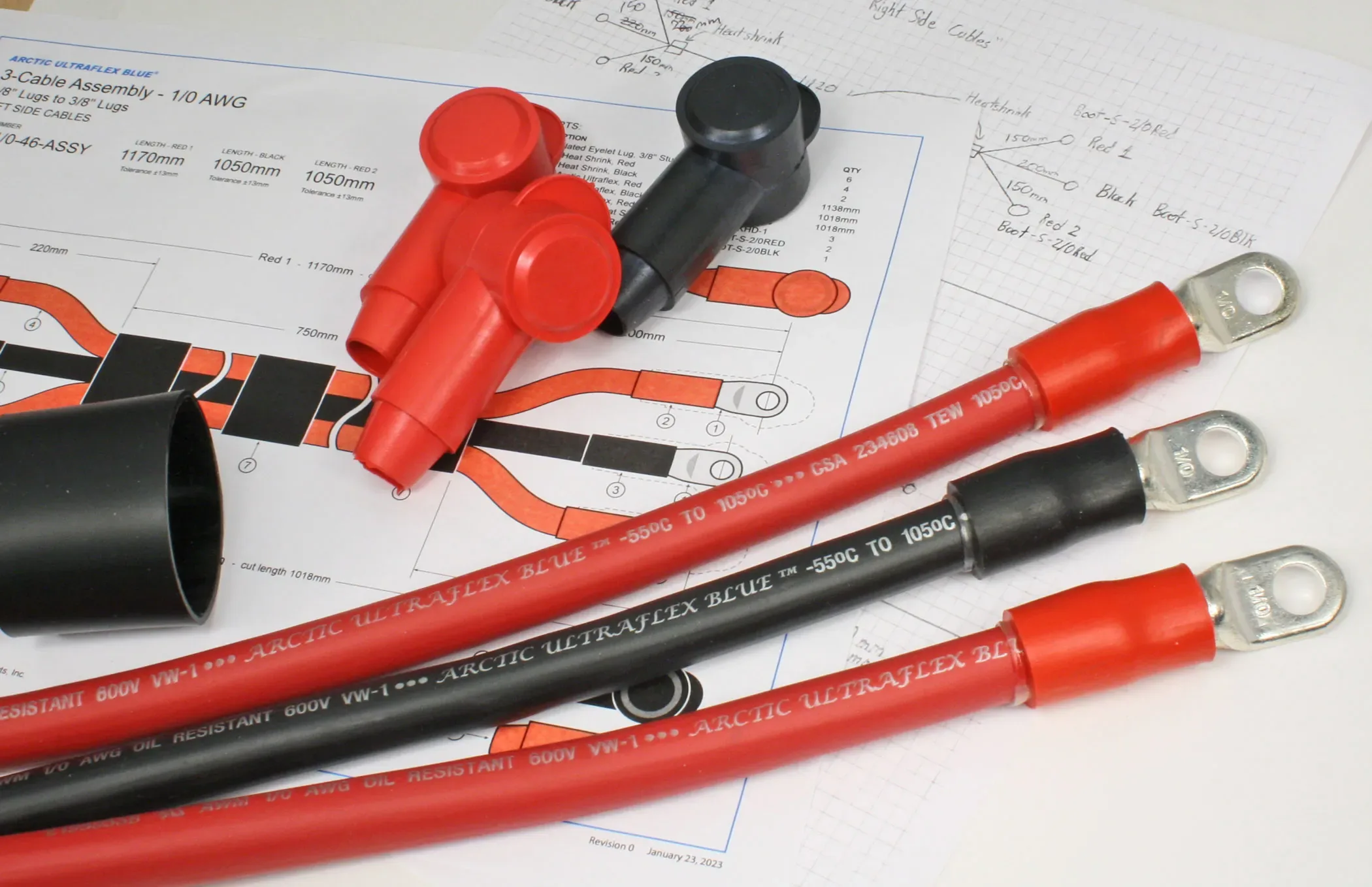 Cables laid over an engineering drawing of the cable