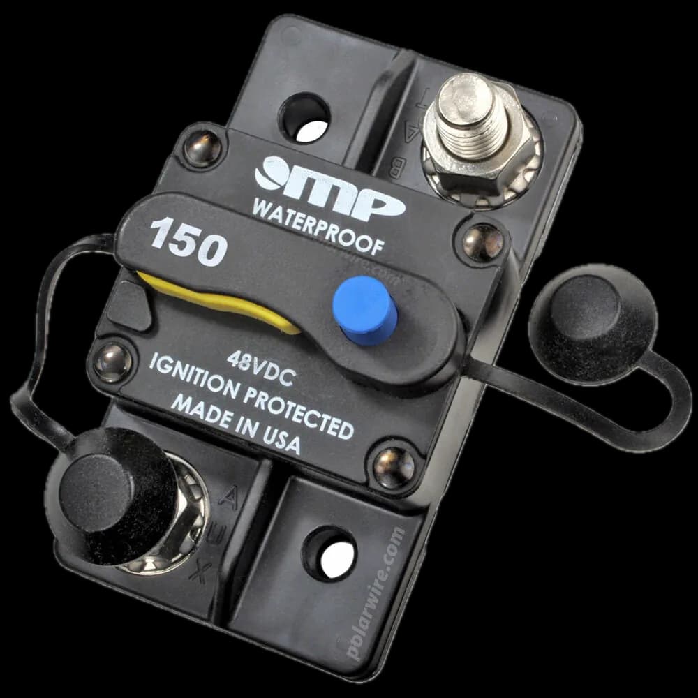 Stud-mount circuit breaker with reset lever and terminal caps