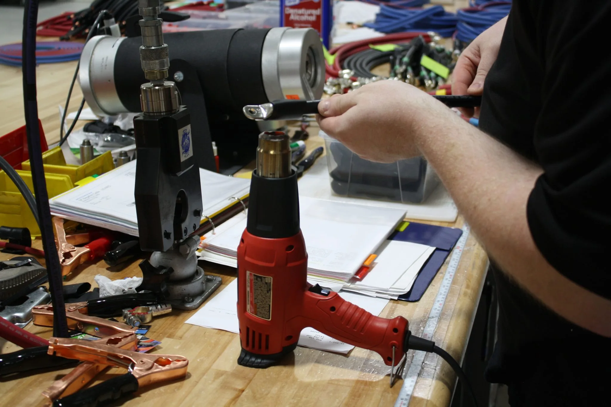 A large-gauge crimp being made on a cable assembly