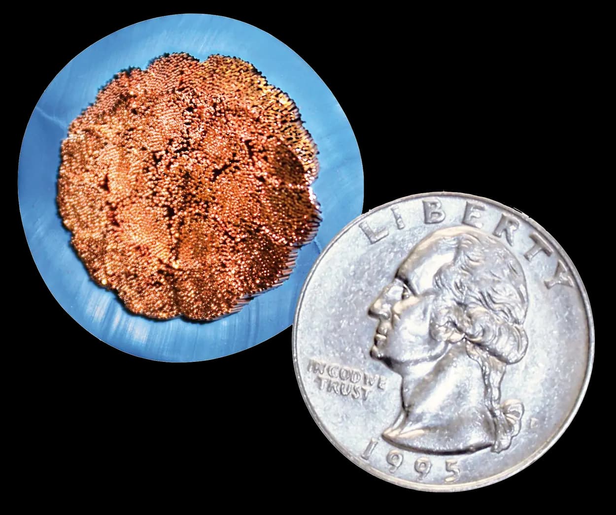 The cut face of 500 MCM Arctic Ultraflex Blue photographed beside a US quarter. The copper is a dense field of thousands of separate fine strands.