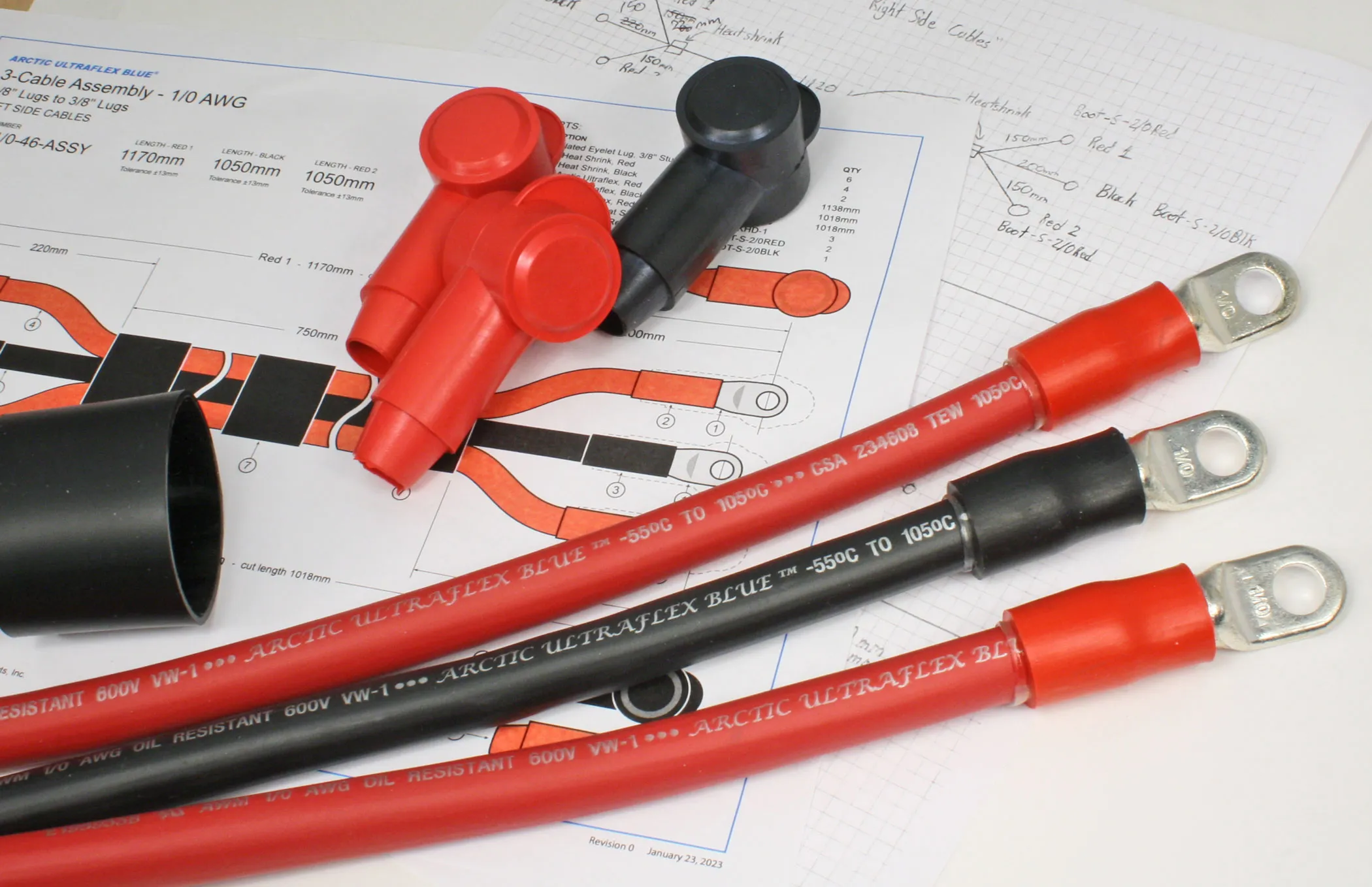 Custom cable assemblies laid on top of an engineering drawing