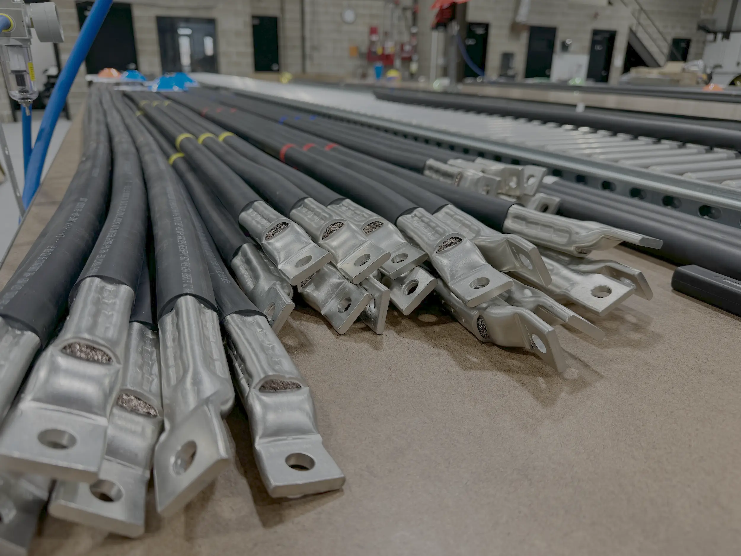 Terminated DLO cable assemblies with compression lugs on a Polar Wire bench