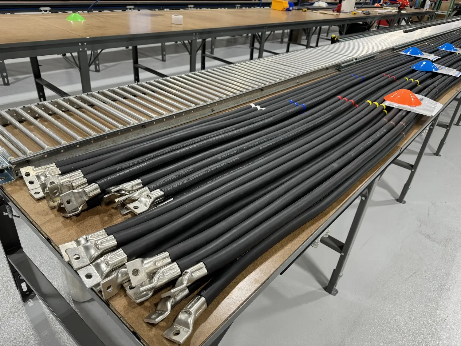 Terminated DLO cable assemblies with compression lugs on a Polar Wire bench