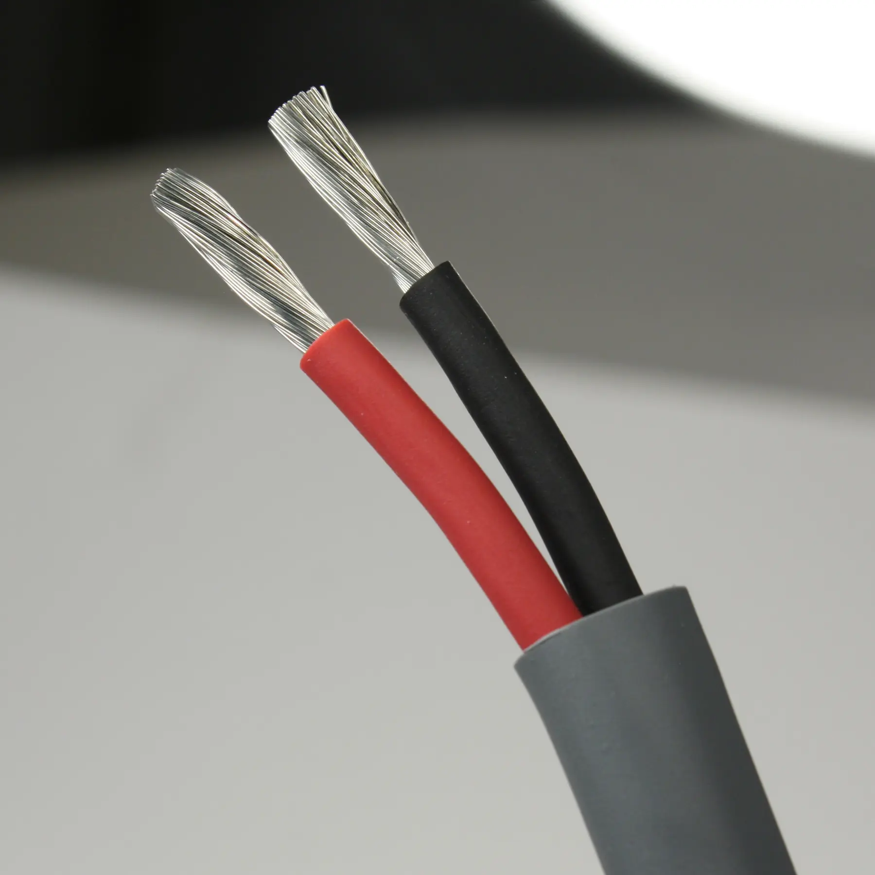 Twin trailer cable, red and black tinned conductors under a gray jacket