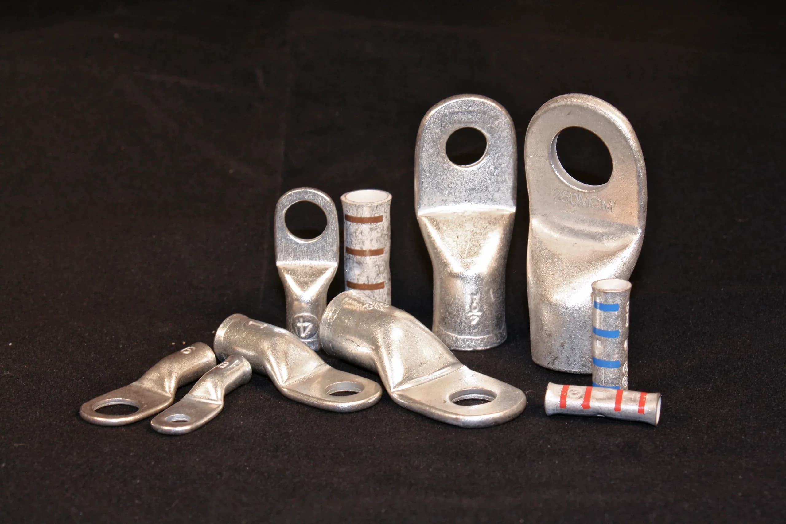 Copper compression lugs and splices in several sizes