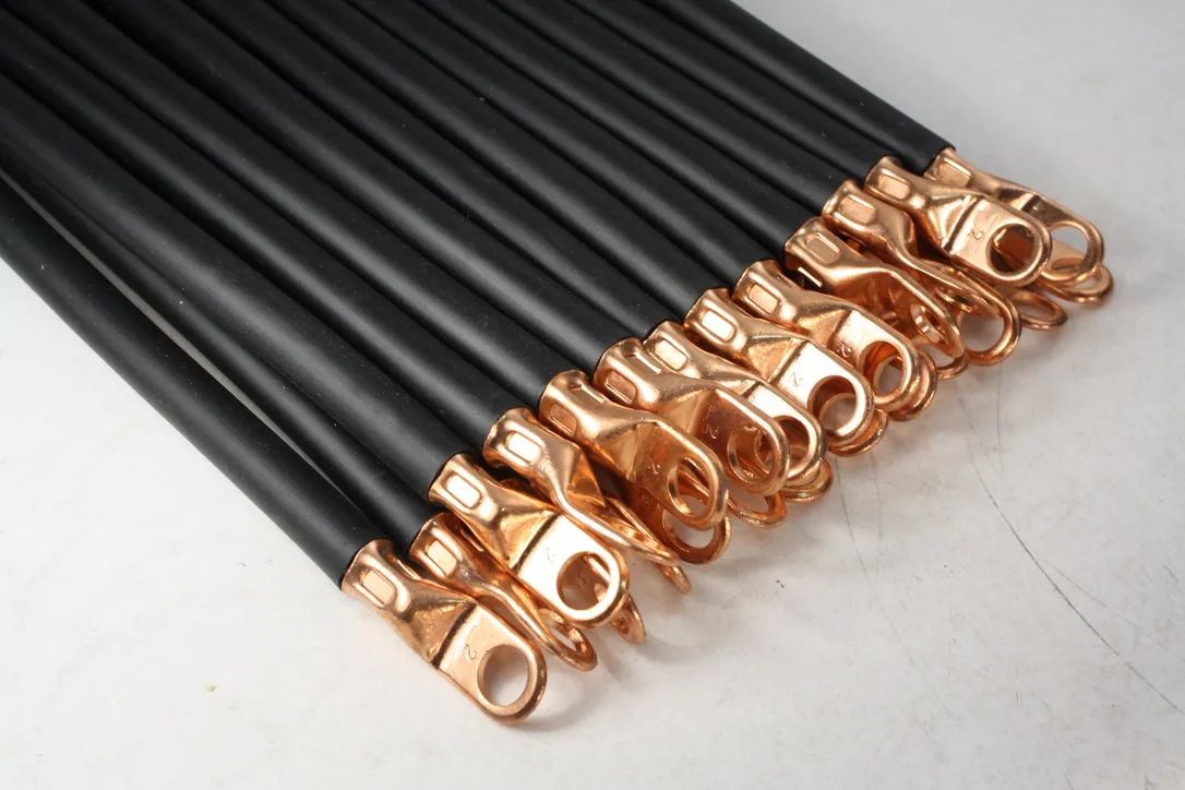 Black cable with terminals attached showing crimping quality