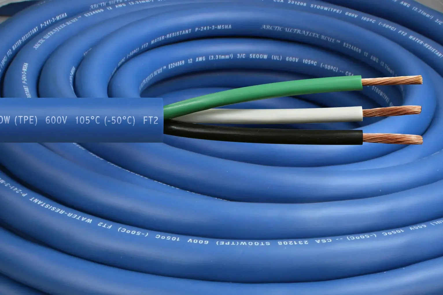 Arctic Ultraflex Blue industrial power cord, jacket cut back to color-coded conductors